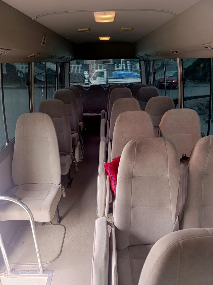 2018 Toyota Coaster available for hire in Lagos, photograph 3